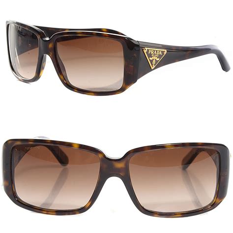 prada curly glasses|Prada tortoiseshell sunglasses.